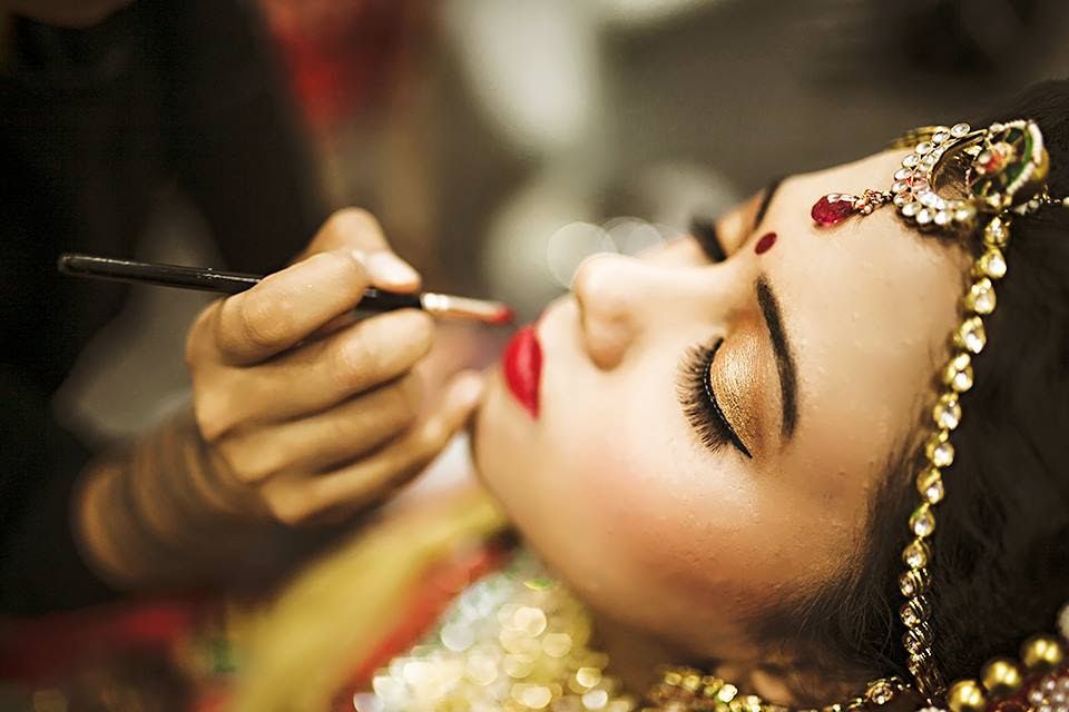 Bridal makeup artist at work